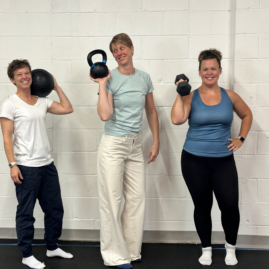The Perfect Squat team training with kettlebells and dumbbells